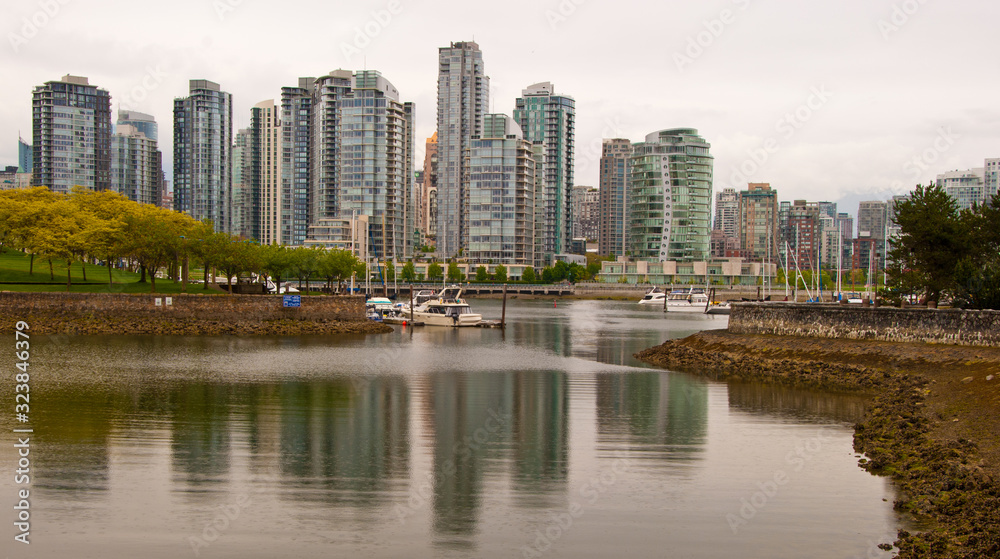 A view of rainy Yaletown from False Creek Sea walk. Downtown of Vancouver. Canada.