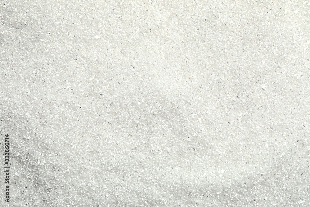 Fototapeta premium Pile of granulated sugar as background, top view