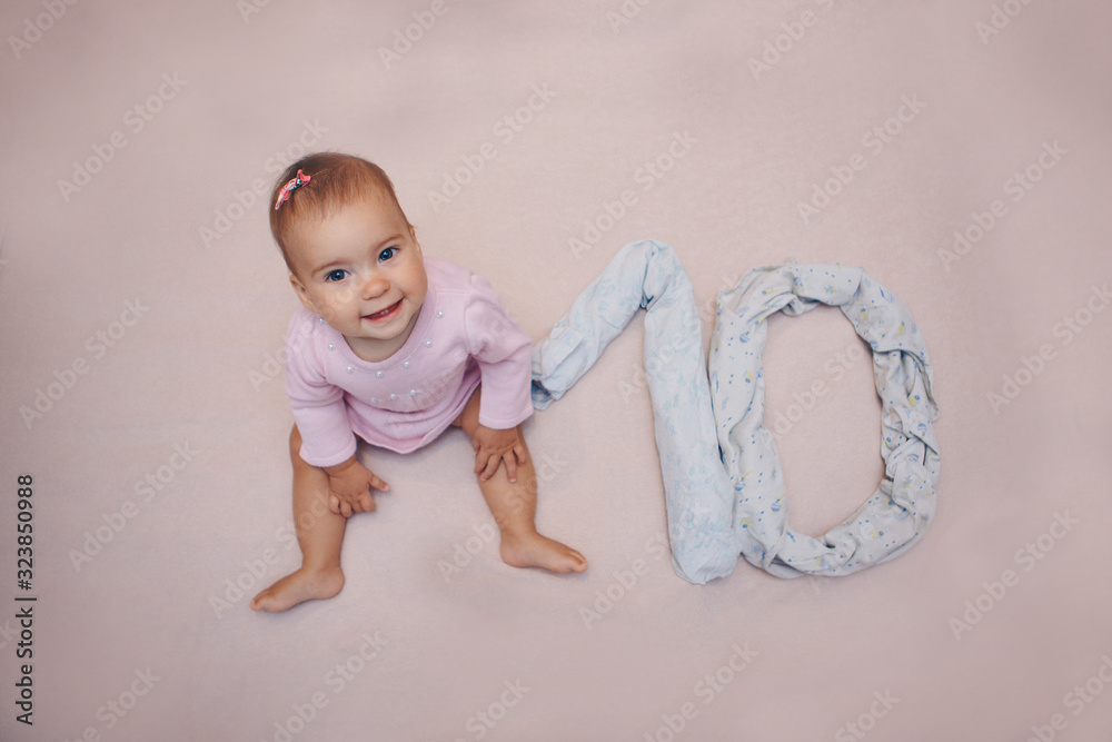 little baby. Figure denoting age. The concept of growing up, IVF, and childhood little baby. Figure denoting age. The concept of growing up, IVF, and childhood