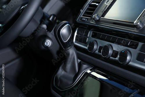 Gearshift and dashboard inside of modern car © New Africa