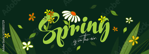 Calligraphy Spring Is In The Air Text with Flowers and Leaves Decorated on Green Background. Header or Banner Design.