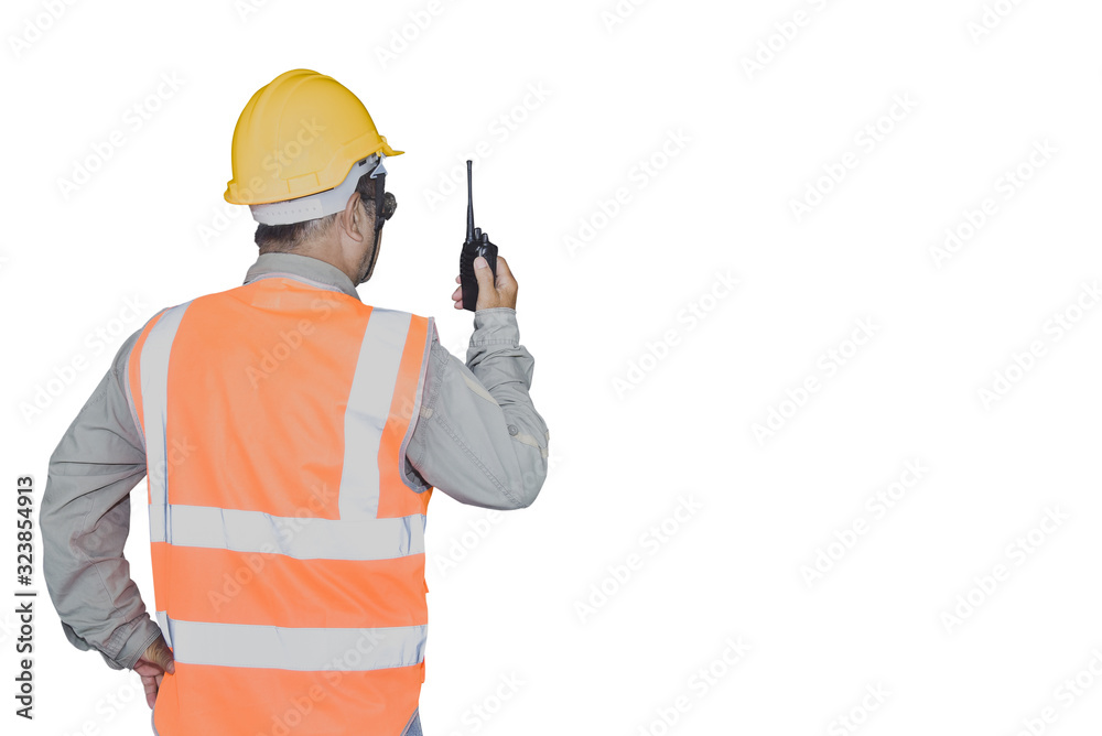 Worker wearing reflective jacket with walkies- talkie in hand isolated on white background with clipping paths copy space. Worker wearing reflective jacket with walkies- talkie in hand isolated on white background with clipping paths copy space.