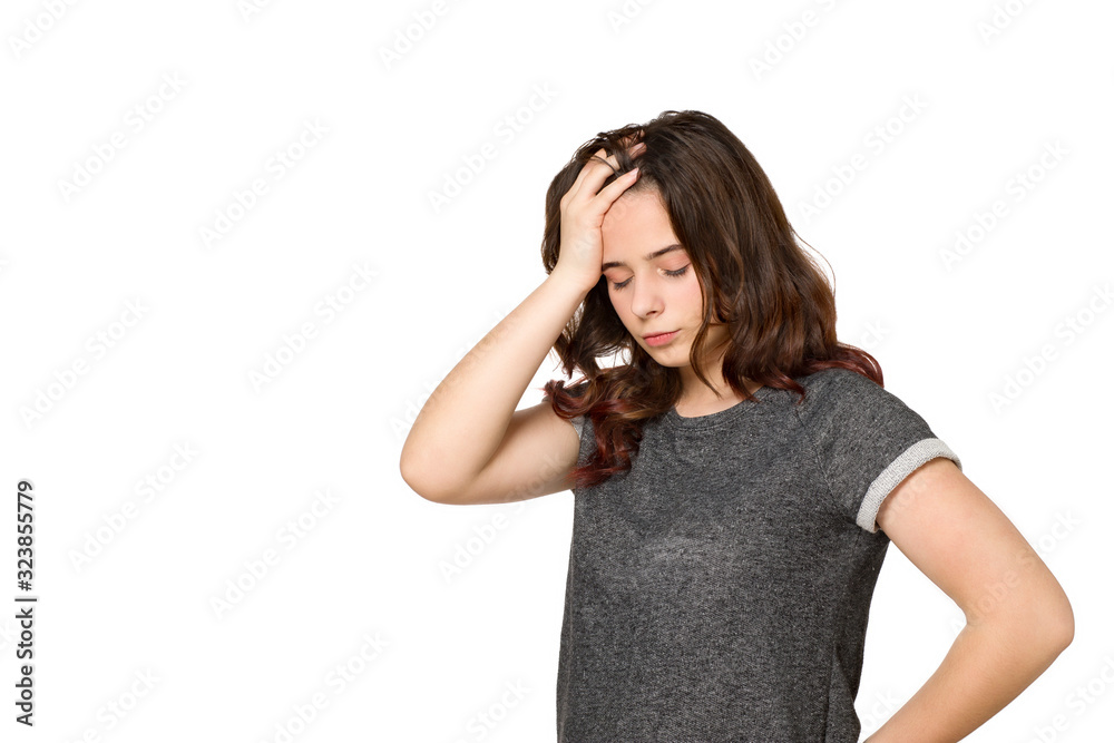 Young teenager with a headache on a white background Young teenager with a headache on a white background