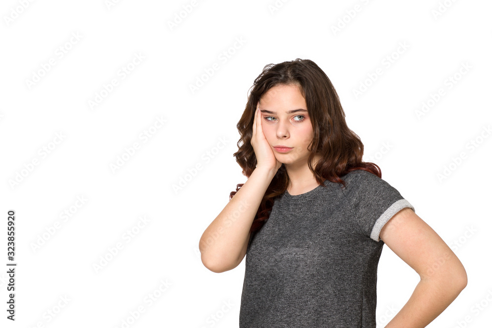 Young teenager thinking over a white background Young teenager thinking over a white background