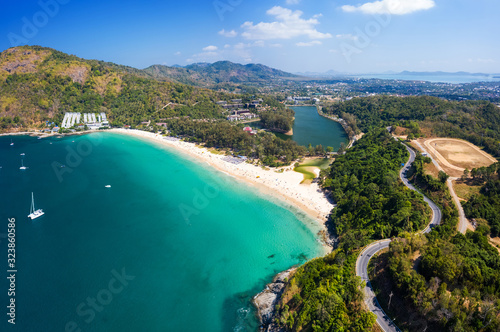 Fototapeta Naklejka Na Ścianę i Meble -  Aerial view of Nai Harn beach during high season, Phuket island, Thailand