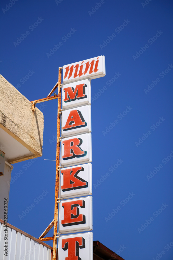 Mini market sign