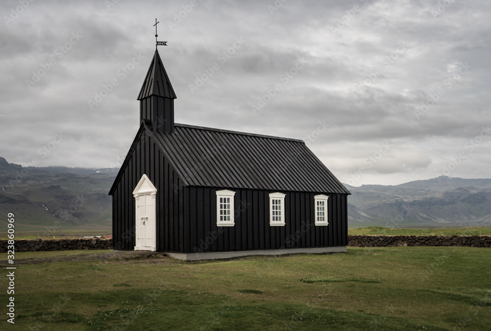 Famous black church in Budir, Iceland on a cloudy day