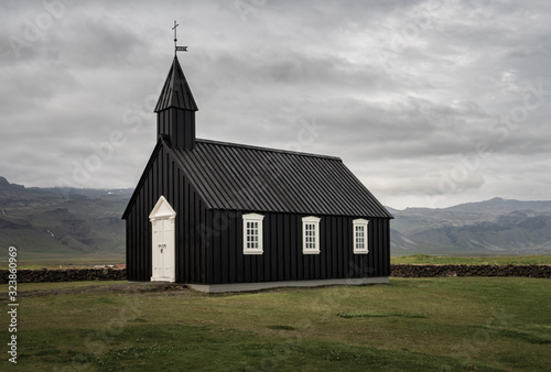 Famous black church in Budir, Iceland on a cloudy day