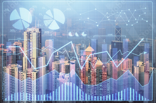 Forex graph on city view with skyscrapers background multi exposure. Financial analysis concept.