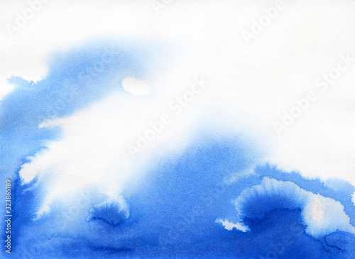 Hand painted blue watercolor background. Watercolor wash. Blue brush strokes background design isolated