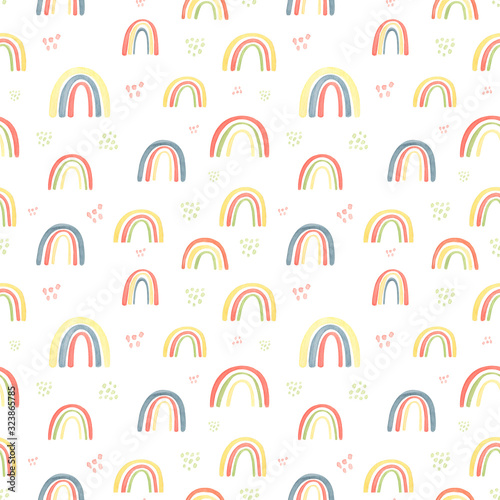 Childish style watercolor rainbow pattern in vintage colors. Seamless pattern on white background. For childrens, kids textile, baby  fashion. Trend palett for spring, summer season. Abstract pattern.