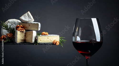 Red wine and soft cheeses with walnuts and rosemary.