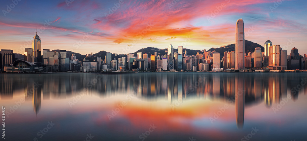 Hong Kong at sunrise with reflection, Financial downtow with skyscrapers