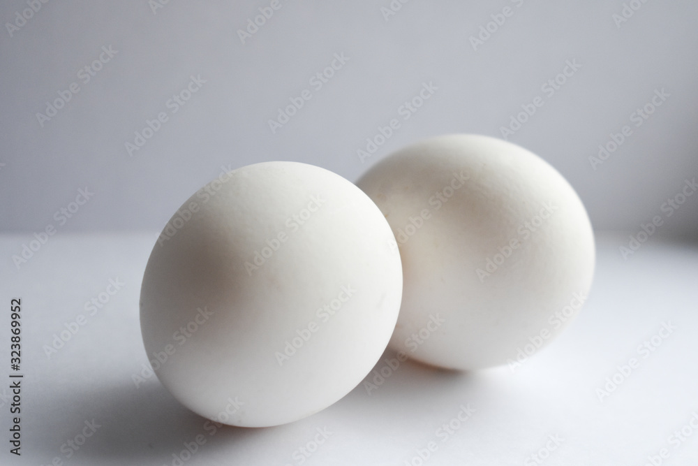 two eggs on a white background two eggs on a white background