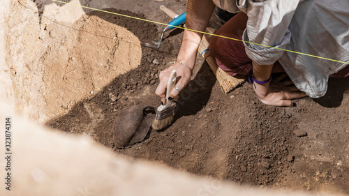 Archaeology - Archeologist Revealing Old Ceramic Object