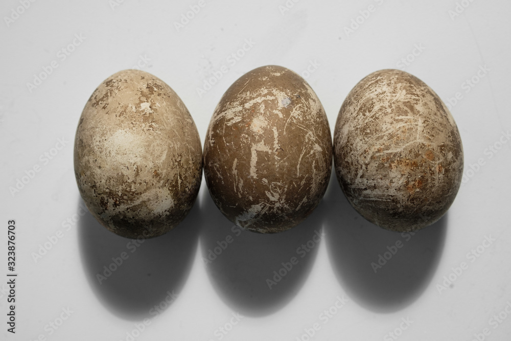 Background with easter eggs. Naturally dyed eggs prepared for Easter on white background. Happy Easter card. Background with easter eggs. Naturally dyed eggs prepared for Easter on white background. Happy Easter card.