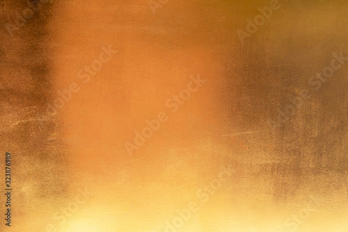 Gold abstract background or texture distress scratch and gradients shadow