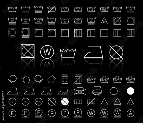 Laundry icons set. Outline set of white laundry symbols vector icons isolated on black background 