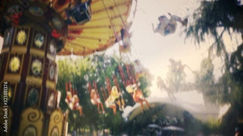 swing ride carousel blur vintage background with shaky camera effect old film filter