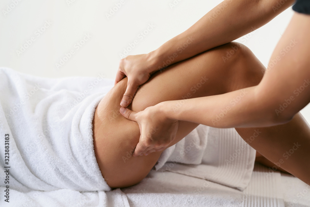 Problems of women body. Close up of anti cellulite massage for young woman in wellness center. Perfect skin fat burning beauty concept Problems of women body. Close up of anti cellulite massage for young woman in wellness center. Perfect skin fat burning beauty concept