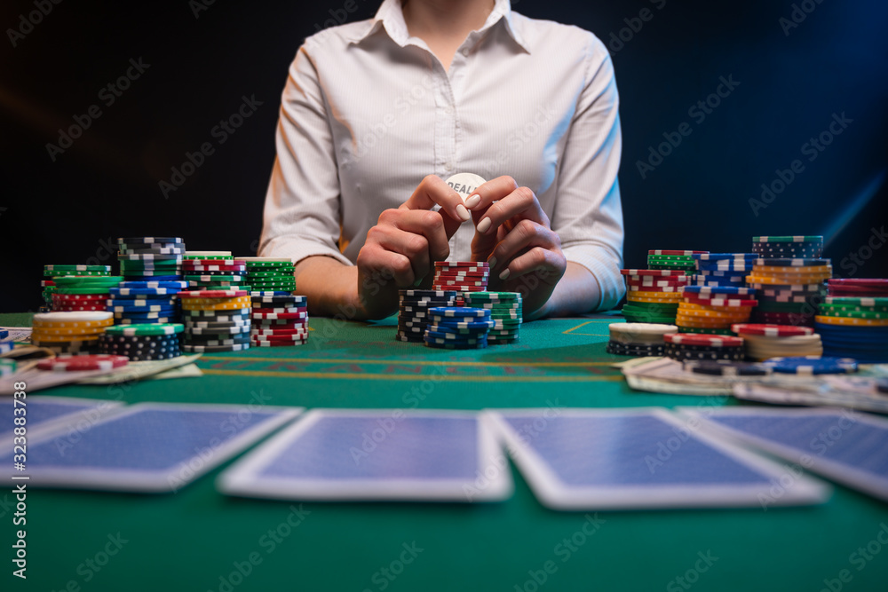 A player in a casino, a lot of money dollars. A screensaver for a casino, a player in a night club. Win and success. A player in a casino, a lot of money dollars. A screensaver for a casino, a player in a night club. Win and success.