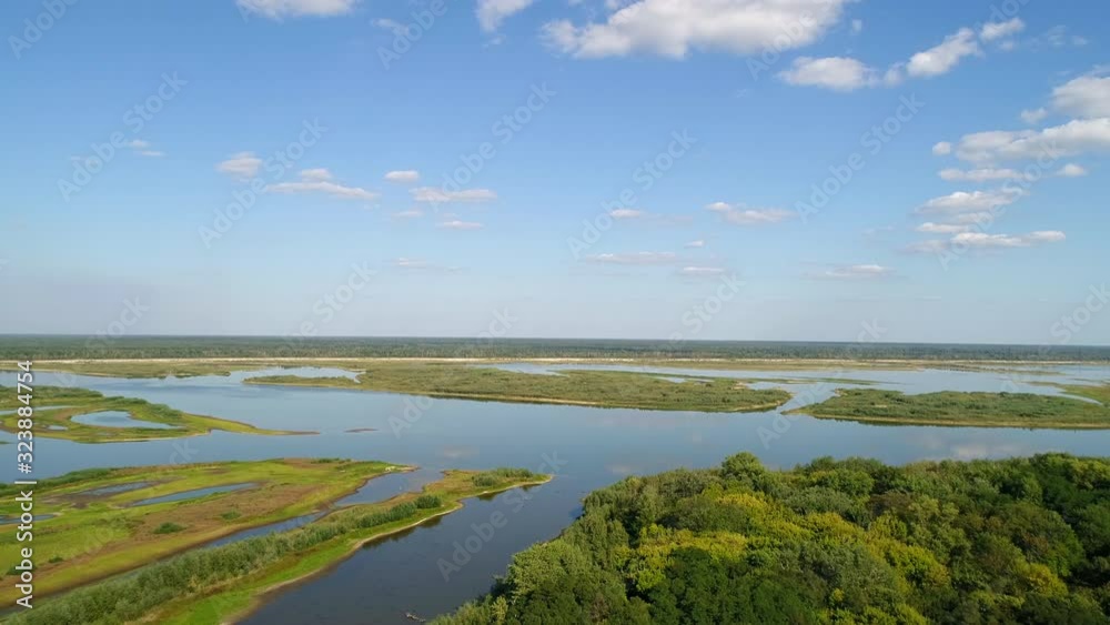 Aerial view of the cooling pond of the Chernobyl Nuclear Power Plant. Exclusion Zone. Camera moves back. 4K drone footage. Aerial view of the cooling pond of the Chernobyl Nuclear Power Plant. Exclusion Zone. Camera moves back. 4K drone footage.