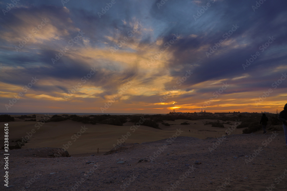 colorful sunset on the Spanish island of Gran Canaria in the Maspalomas dunes colorful sunset on the Spanish island of Gran Canaria in the Maspalomas dunes