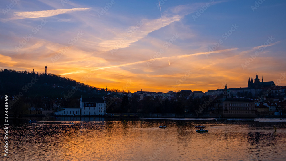 Fototapeta premium Beautiful sunset on the Vltava river. Prague city, CZ