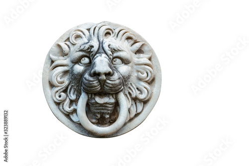 plaster head of a lion as a decoration element of a building facade isolated on white background