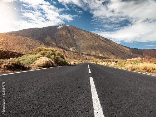Beautiful mountain highway going through dry rocky desert to volcano Teide, Tenerife, Canary islands