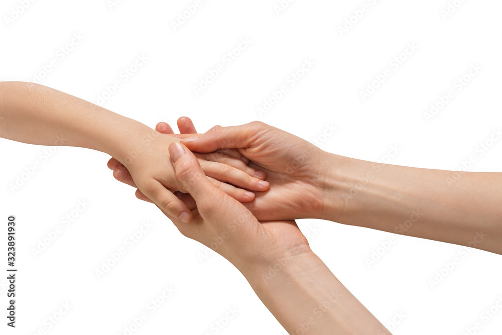 The hand of the child is in female hands. The hand of the child is in female hands.