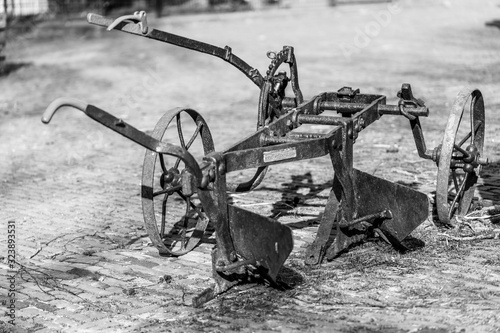 old plough in the sand