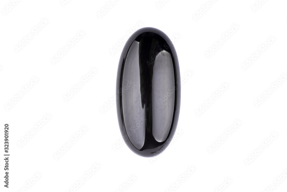 Black cabochon stone on a white background Black cabochon stone on a white background