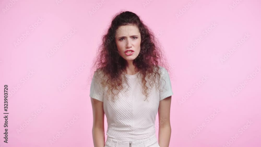 irritated woman screaming isolated on pink irritated woman screaming isolated on pink