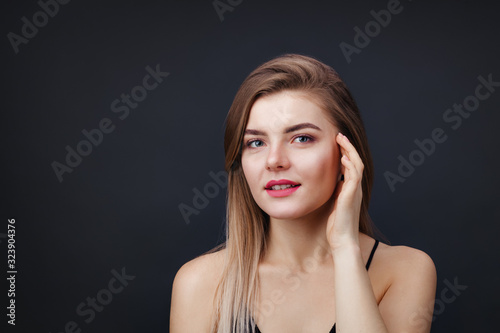 Portrait of beautiful lady with natural makeup and smooth healthy skin