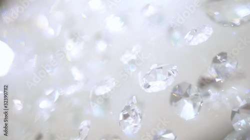 Crystal and diamonds wall chandelier background. Beautiful low angle track shot of a luxury wall chandelier. Close up of the crystals and diamonds. With bling bling shining reflection.