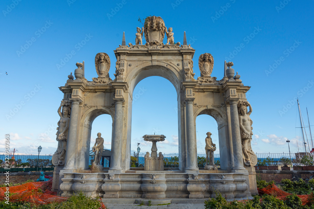 Obraz premium The Fountain of the Giant is a monumental fountain in Naples. Situated on via Partenope, near the Castel dell'Ovo. It is also called the Fontana dell'Immacolata.