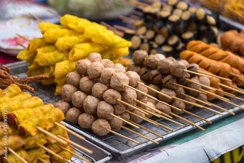 Meatballs with bamboo, wood stick. Traditional Street Food Thailand.