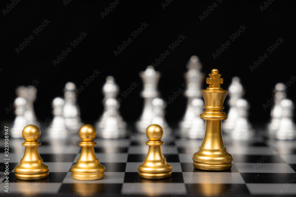 Chess game on a black background with business strategy planning ideas and connect for successful business information concepts. Chess game on a black background with business strategy planning ideas and connect for successful business information concepts.