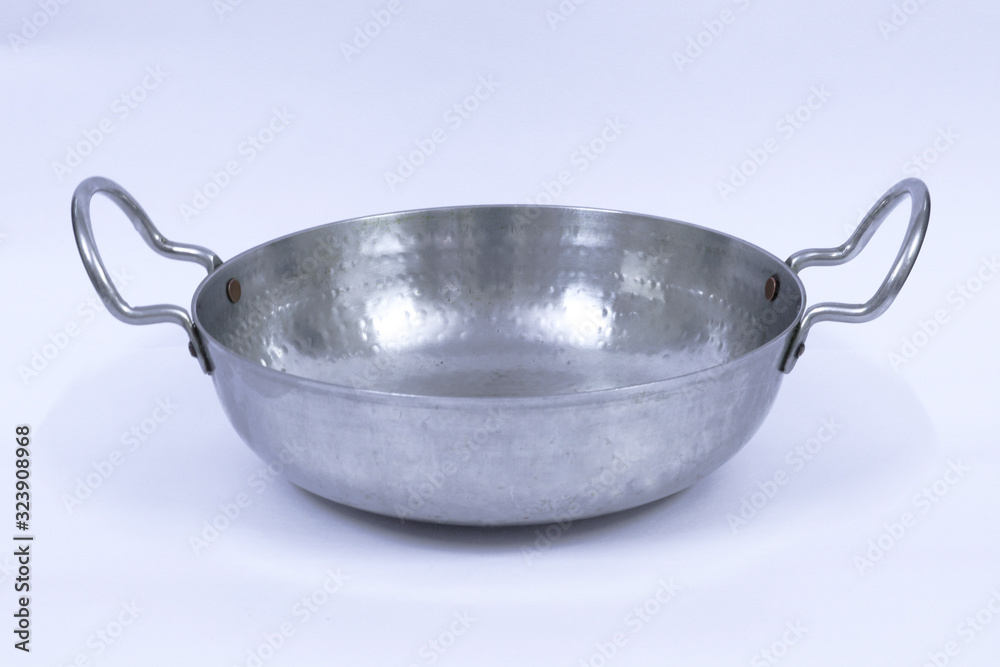 A stainless steel Indian frying pan A stainless steel Indian frying pan