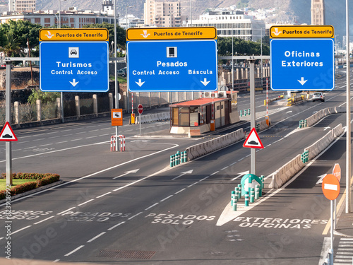 Image of busy highway with road direction signs at port in city of Santa Cruz de Tenerife