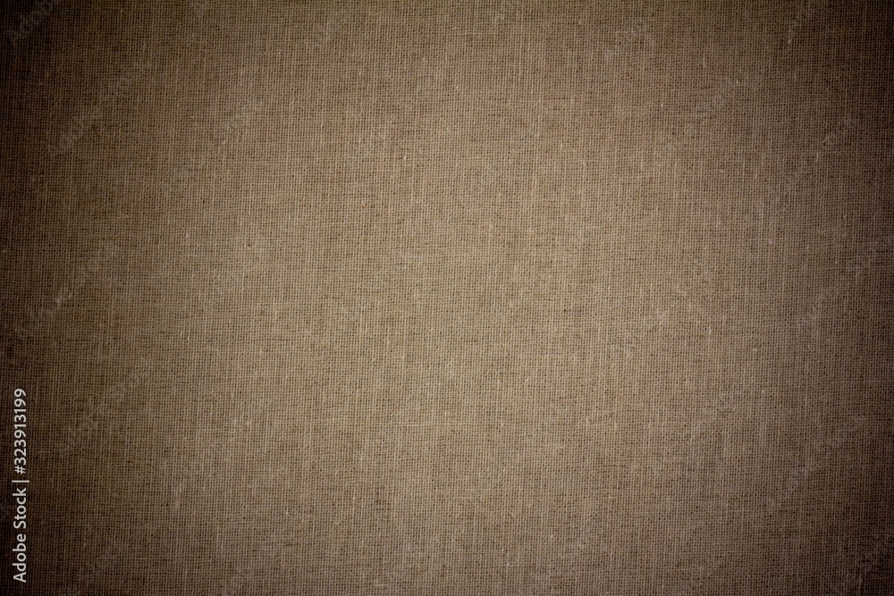 background texture of dark grey canvas fabric with vignette background texture of dark grey canvas fabric with vignette