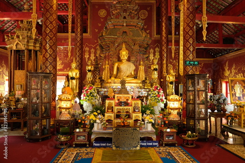 Chiang Mai Thailand - Temple Chiang Man main meditation hall with golden Buddha statue