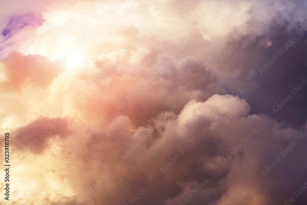Heaven. Epic Dramatic storm cumulus clouds with yellow orange sun and sunlight Heaven. Epic Dramatic storm cumulus clouds with yellow orange sun and sunlight