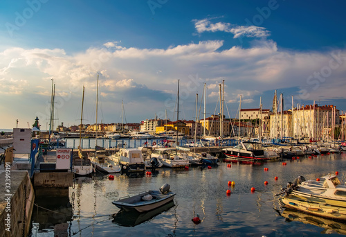 Harbour of Piran, Slovenia. Yachts and boats under picturesque sky