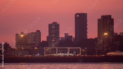 Timelapse of large modern seafacing office building Mumbai photo