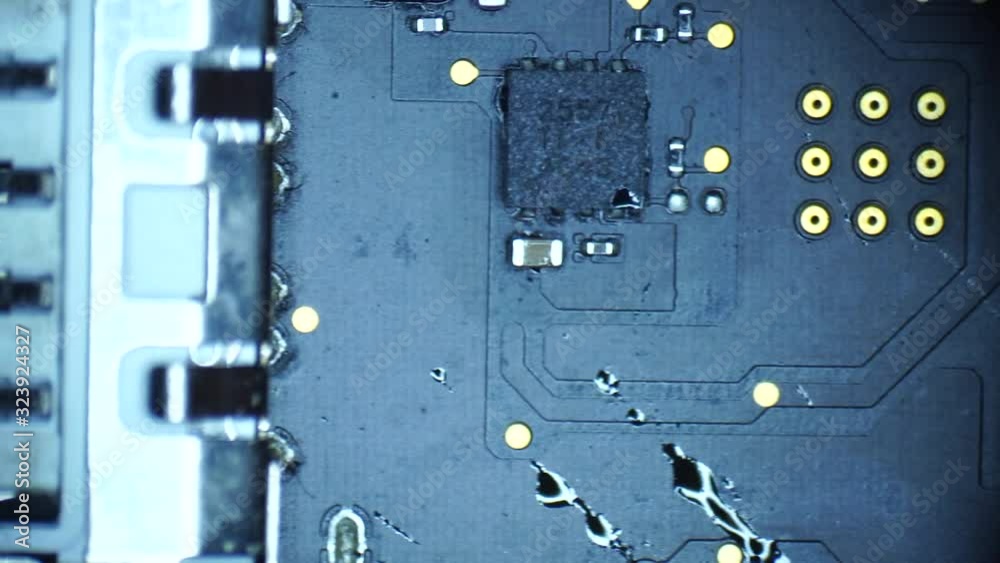 Chip under the microscope, mainboard, motherboard Chip under the microscope, mainboard, motherboard