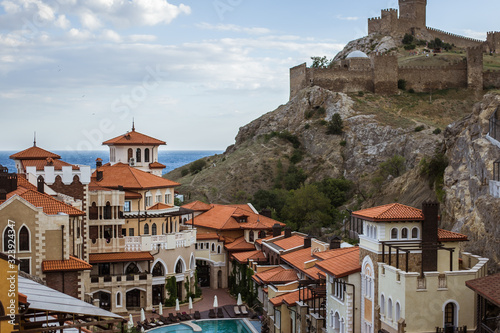 Walls and towers of ancient Genoese fortress in the city of Sudak, Crimea, Russia photo