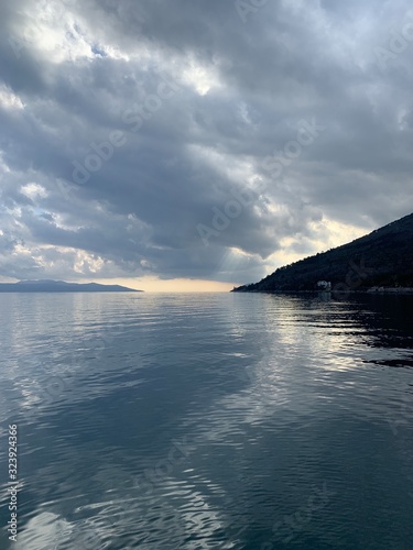 Sky reflection on the surface of the sea, natural colors photo