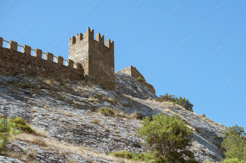 Walls and towers of ancient Genoese fortress in the city of Sudak, Crimea, Russia Walls and towers of ancient Genoese fortress in the city of Sudak, Crimea, Russia